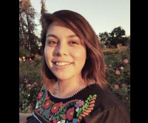 Headshot of Fernanda E. Ocaña, smiling