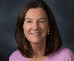 Headshot of Linda McGlone, smiling